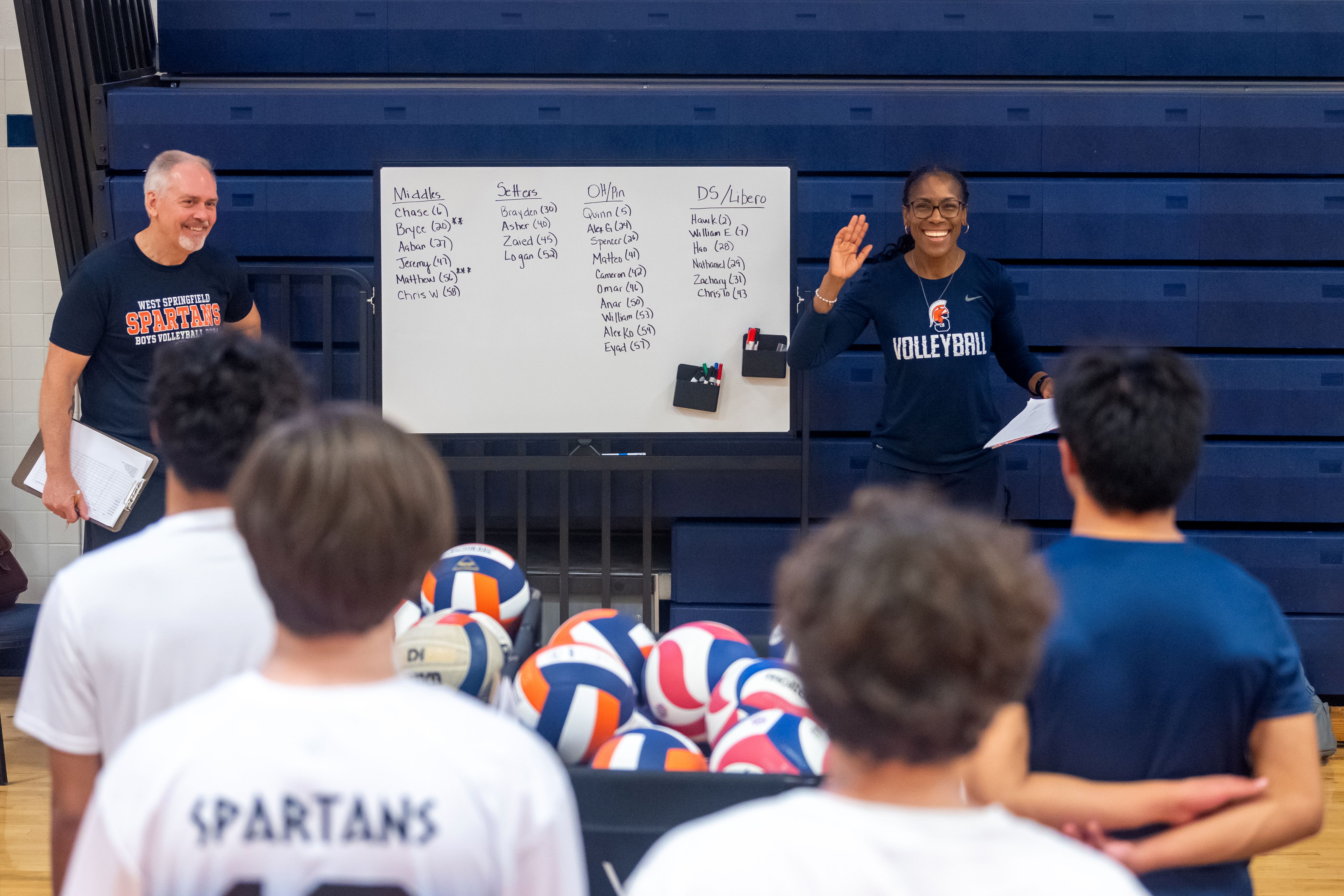 Coach Eaton and Assistant Coach Bill Hazard (left) speak to the students during tryouts.