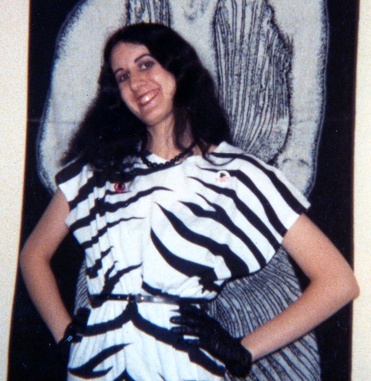 Picture of a teen girl in zebra striped dress.