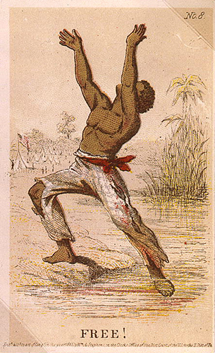 Circa 1863 illustration of a male slave reaching upward, his arms outstretched. The word free is printed in bold letters beneath him.
