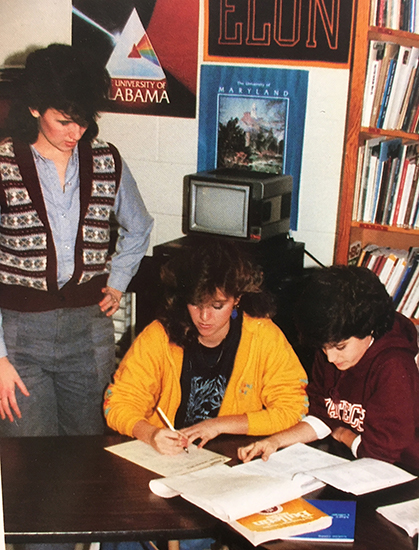 Color photograph of three female students from a 1980s-era West Springfield High School yearbook.